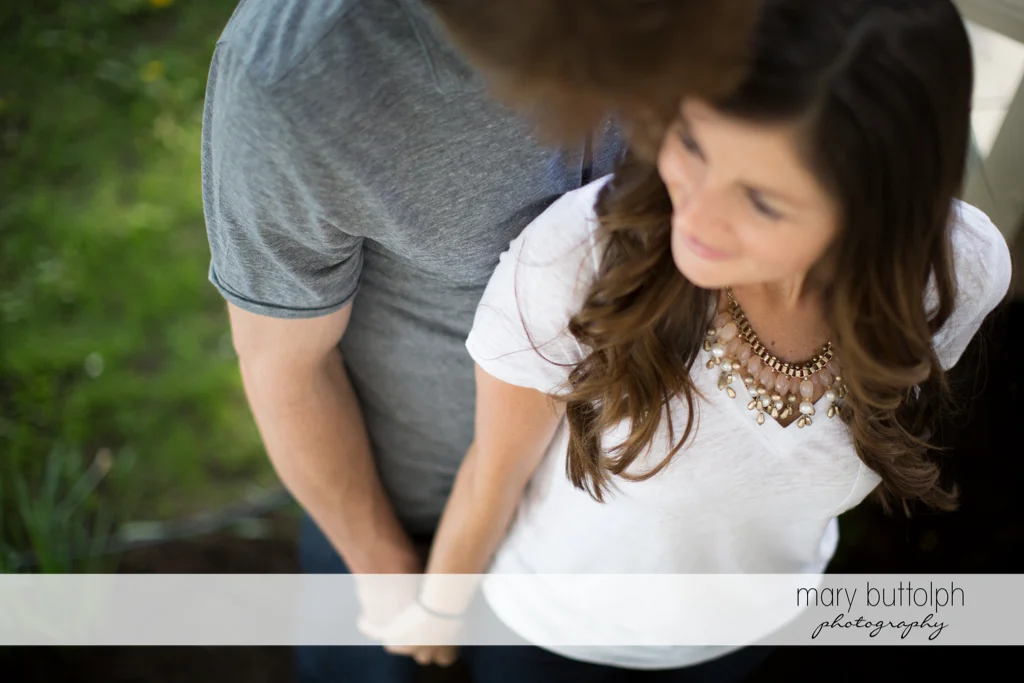 Couple in overhead shot in the garden at Skaneateles Engagement