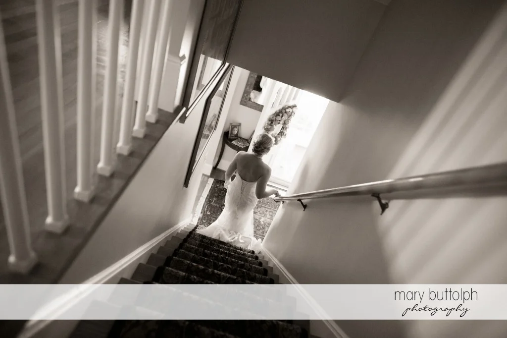 Long shot of bride going downstairs at Emerson Park Pavilion Wedding