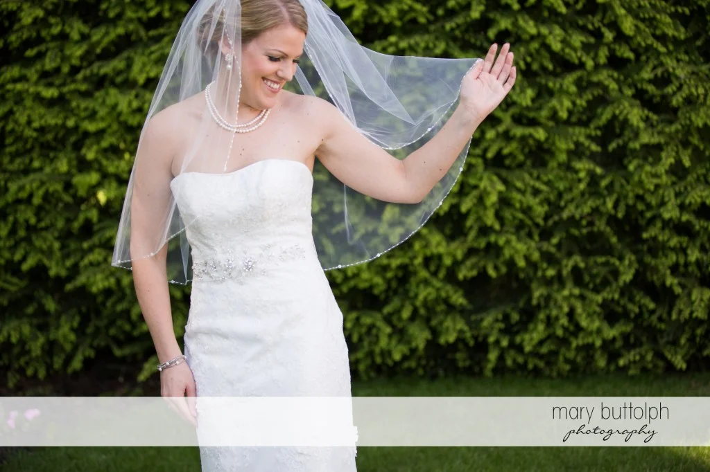 Veiled bride in the garden at Emerson Park Pavilion Wedding