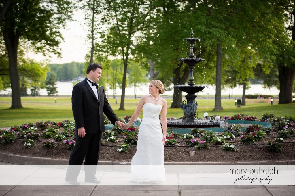 Another great shot of the happy couple in front of the iconic fountain at Emerson Park Pavilion Wedding
