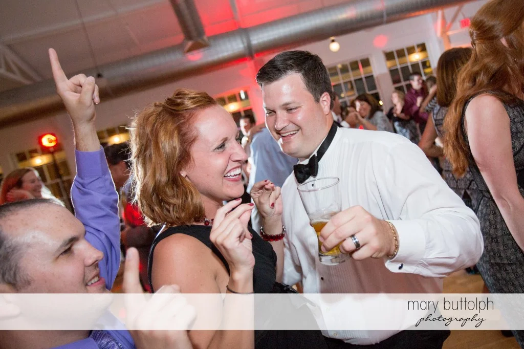 Groom and guests have a great time on the dance floor at Emerson Park Pavilion Wedding