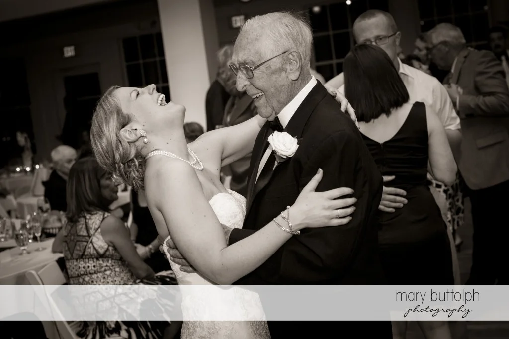 Bride and an elderly gentleman dance at Emerson Park Pavilion Wedding