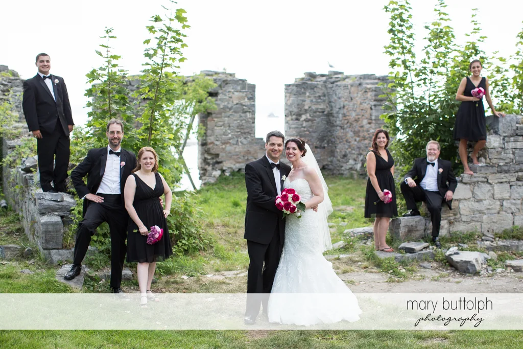 The wedding party in the ruins at the Inns of Aurora Wedding
