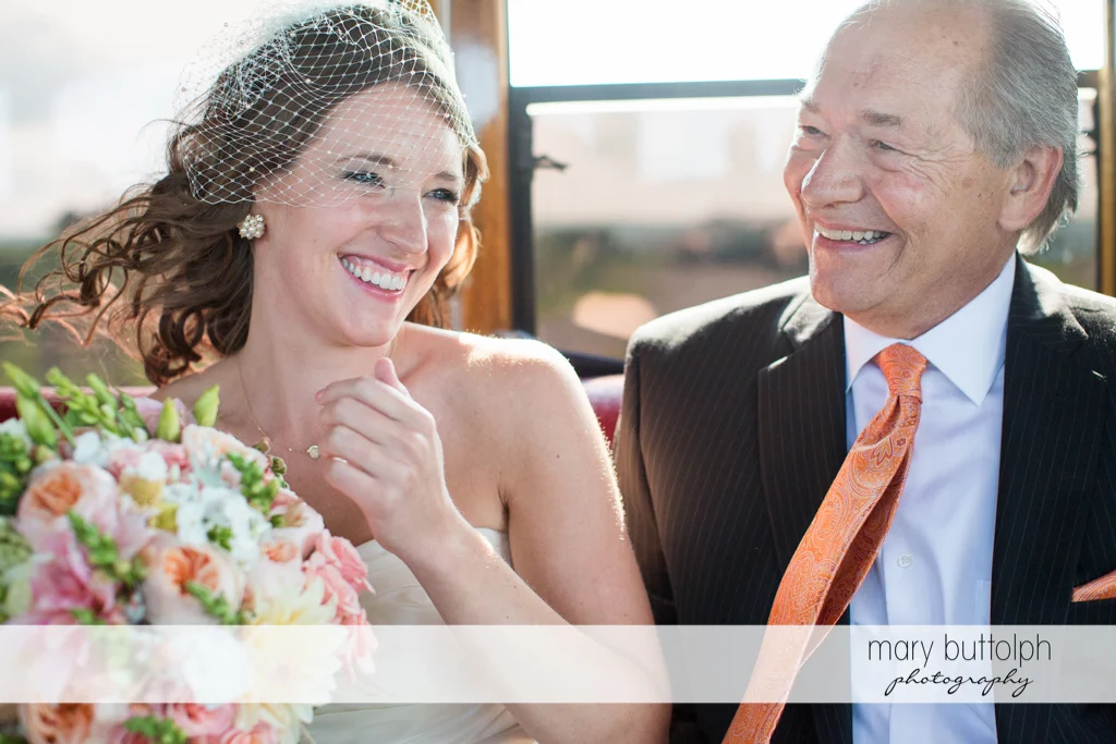 Bride shares a happy moment with her father at the Inns of Aurora Wedding