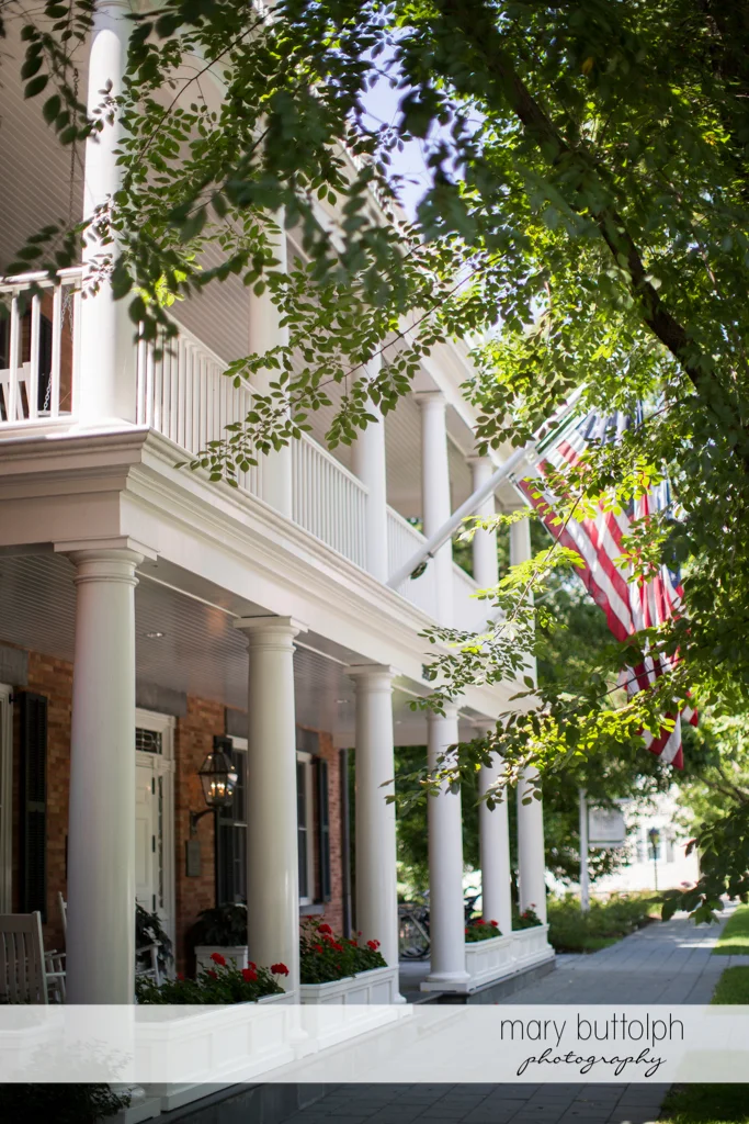 Facade of the wedding venue with the American flag at the Inns of Aurora Wedding