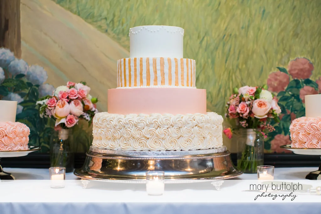 Couple's wedding cake at the Inns of Aurora Wedding