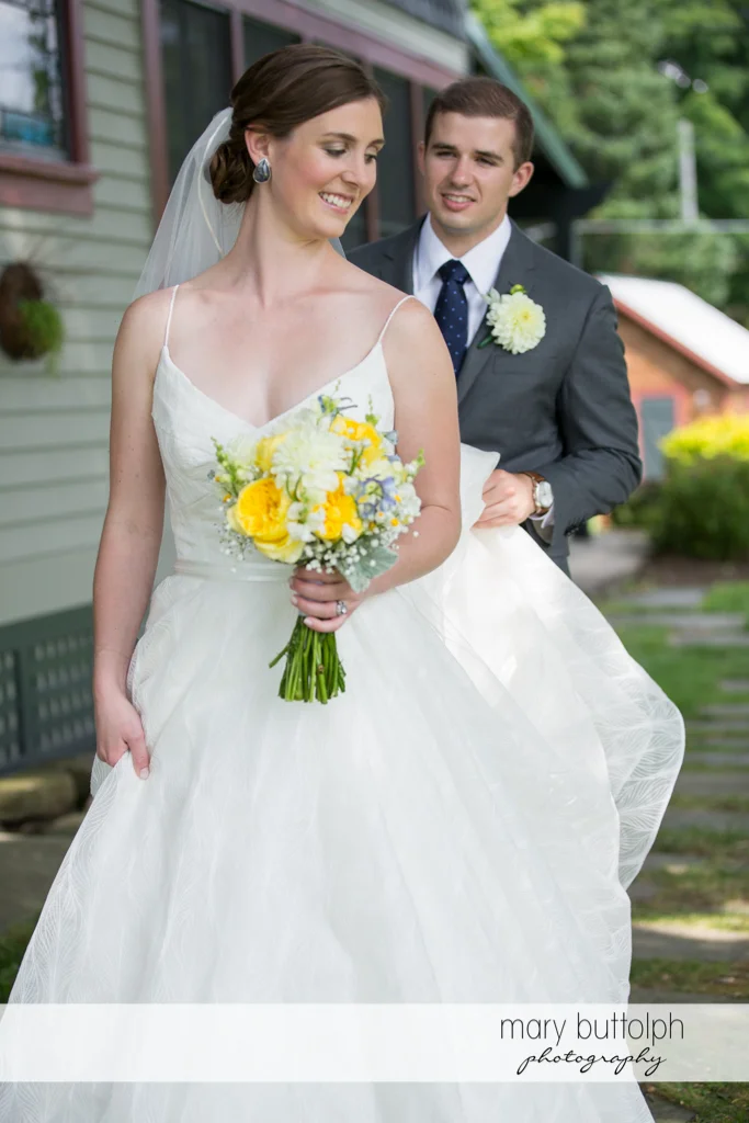 Couple pose in the garden at the Hamilton Inn Wedding