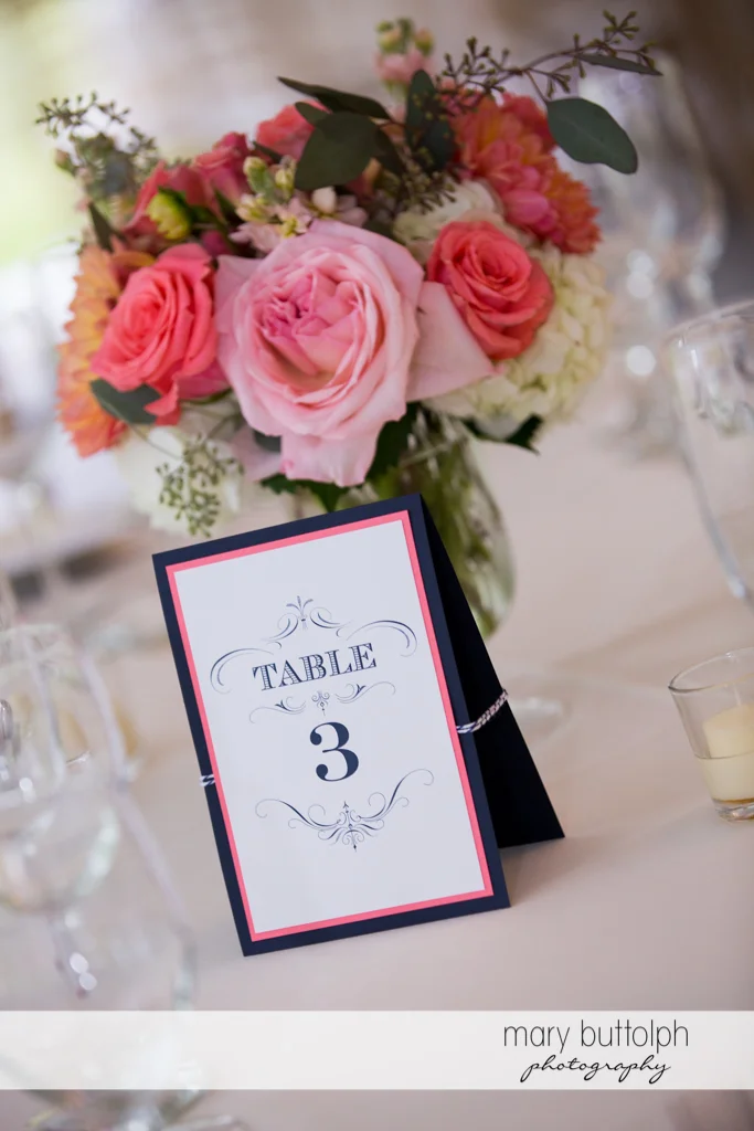 Close up shot of the numbered tables with flowers at the Inns of Aurora Wedding