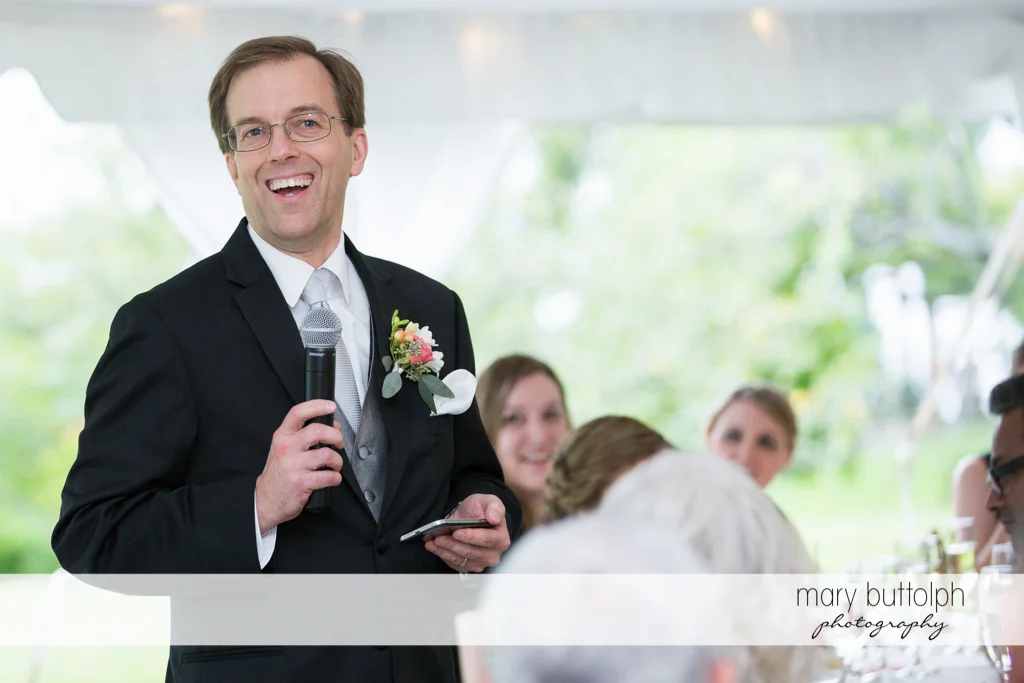 Bride's father makes an announcement at the Inns of Aurora Wedding