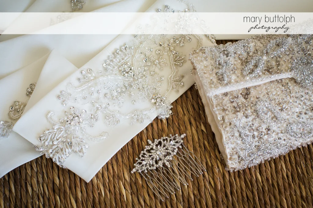 Close up of the bride's wedding gown and her hairpin at the Inns of Aurora Wedding