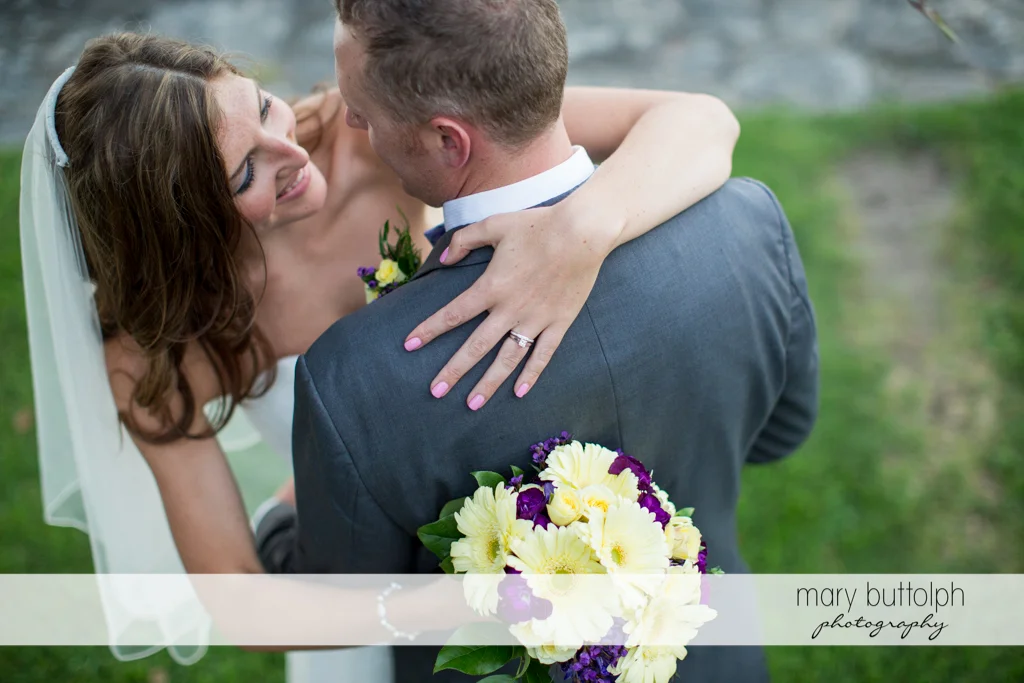Couple embrace in the garden at the Sherwood Inn Wedding