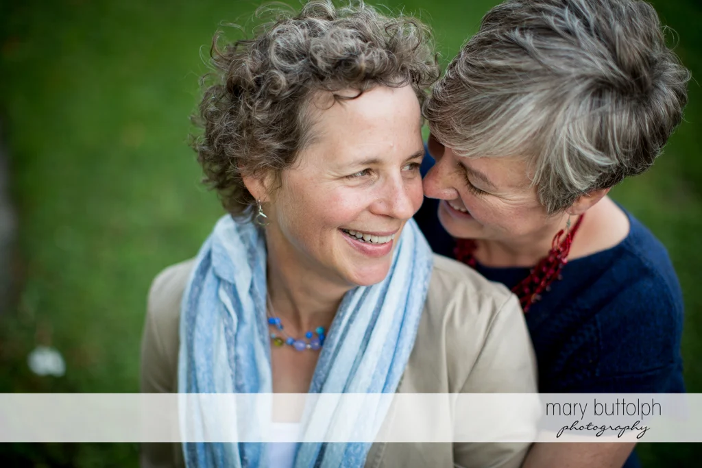Same sex couple in a happy mood at Skaneateles Lake Engagement