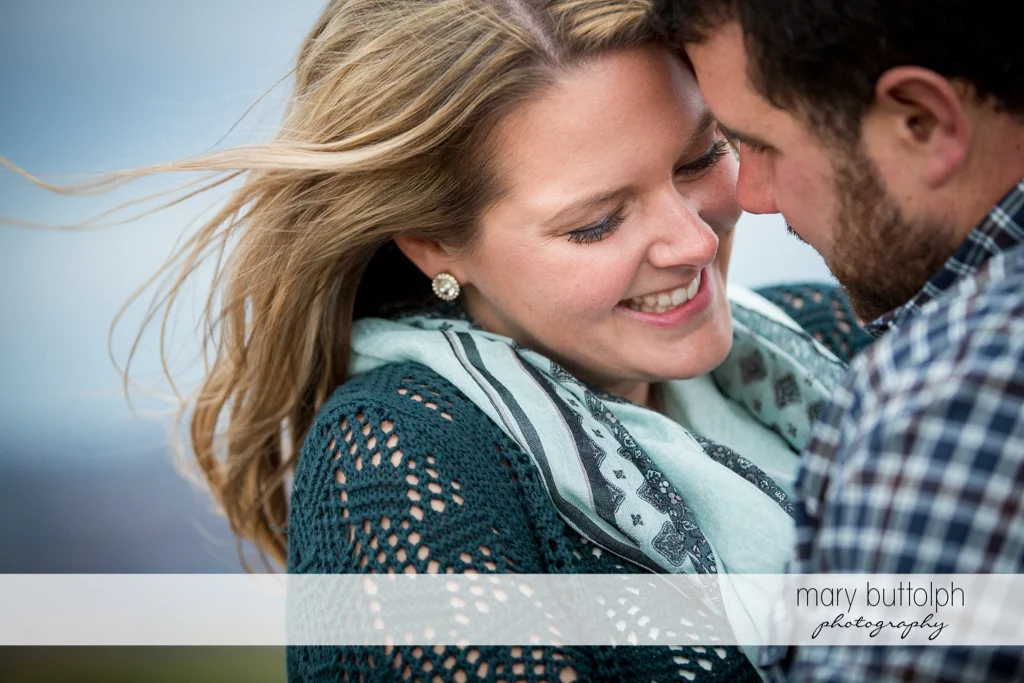 Couple in close up shot at Beak & Skiff Apple Orchards Engagement