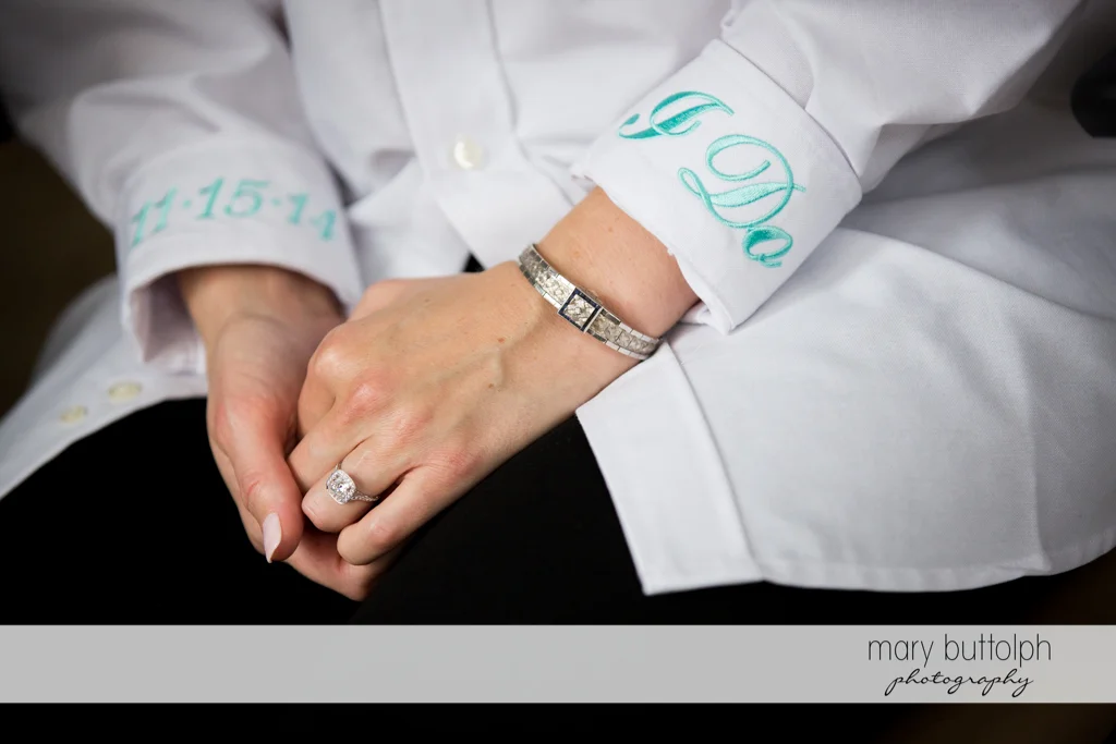 Close up shot of bride's wedding ring and bracelet at Rowland House Wedding