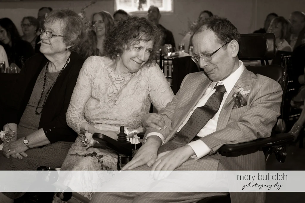 Bride's parents at the wedding ceremony at Frog Pond Bed & Breakfast Wedding