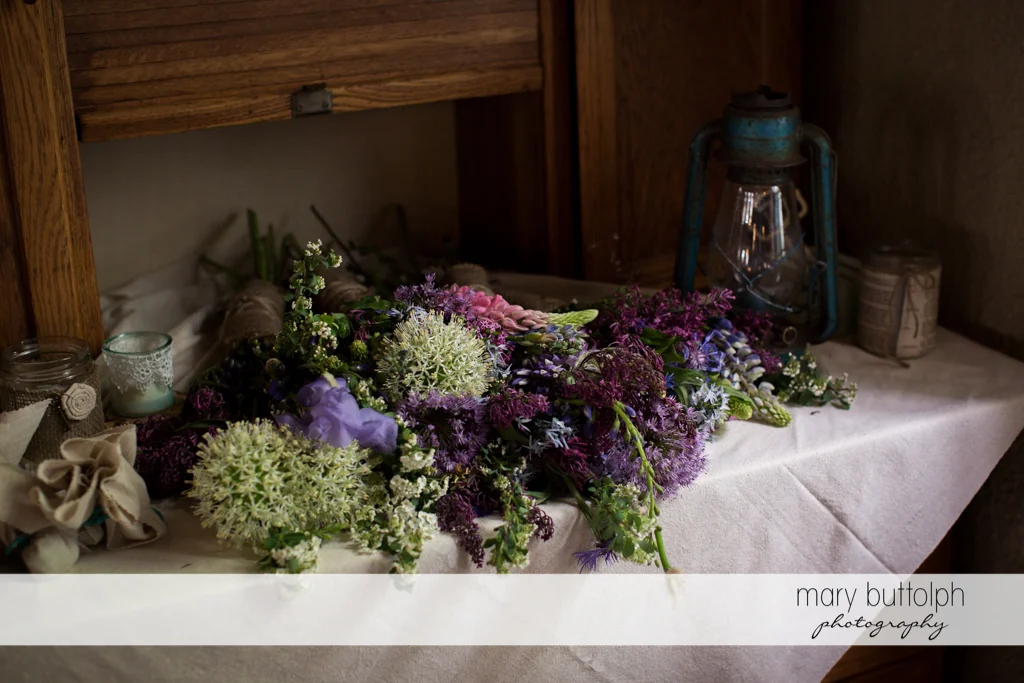 A bunch of flowers on the table at Frog Pond Bed & Breakfast Wedding