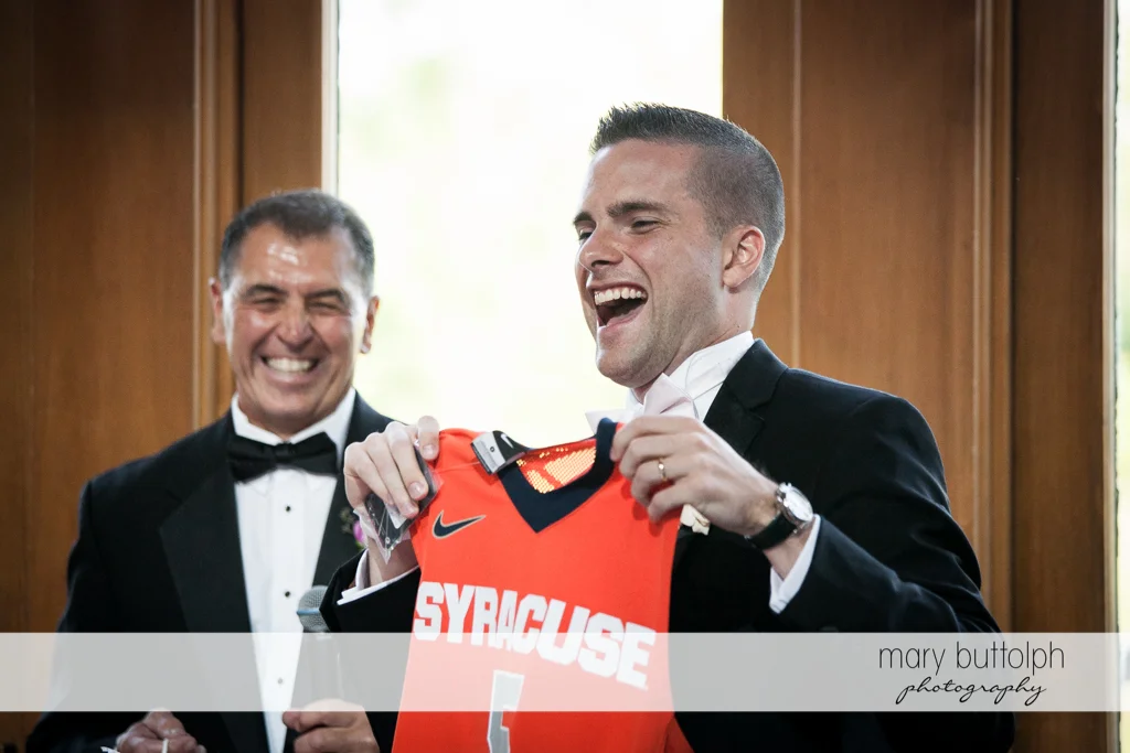Groom and the bride's father have a laugh at the Lodge at Welch Allyn Wedding
