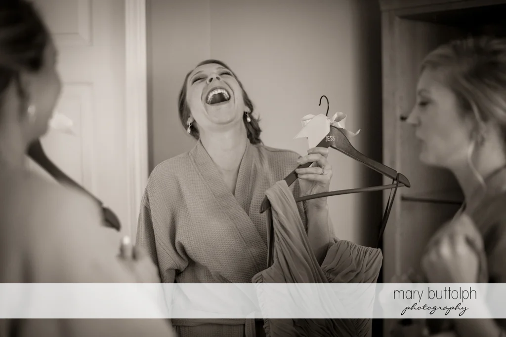Bride finds something funny at the Lodge at Welch Allyn Wedding