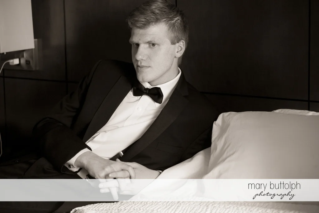Groom in a serious mood at the Lodge at Welch Allyn Wedding