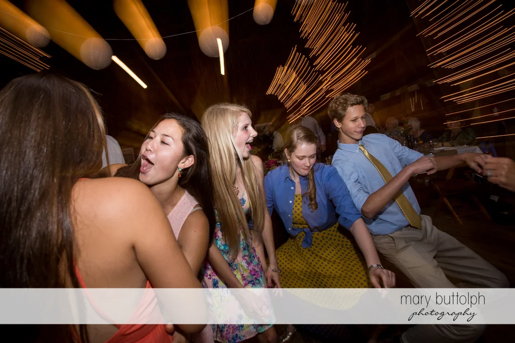 Guests show their dance moves at Mandana Barn Wedding
