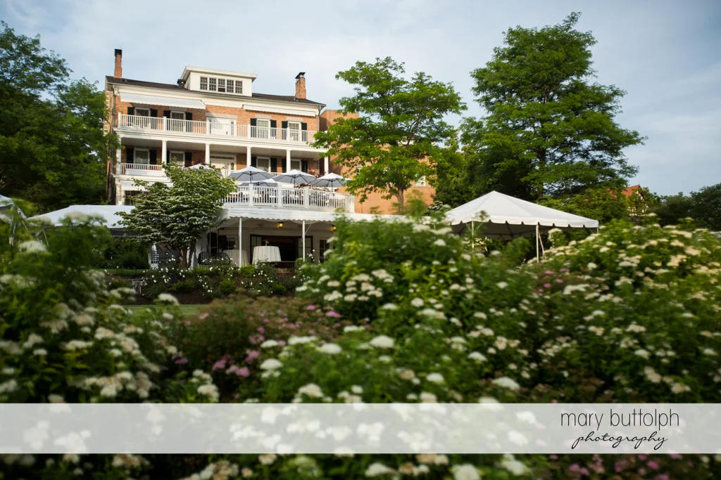 View of the wedding venue surrounded by flowers at the Inns of Aurora Wedding