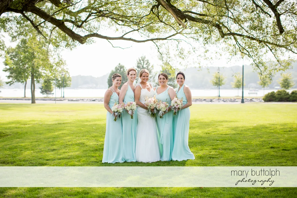 Bride and bridesmaids in the garden at Emerson Park Pavilion Wedding