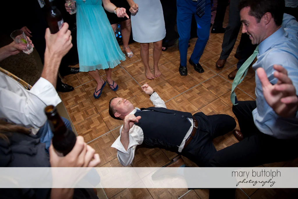 One of the guests shows his dancing skills at Skaneateles Country Club Wedding
