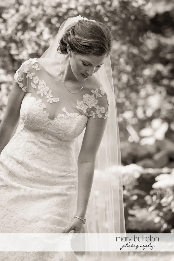 Bride in dramatic black and white shot at Skaneateles Country Club Wedding