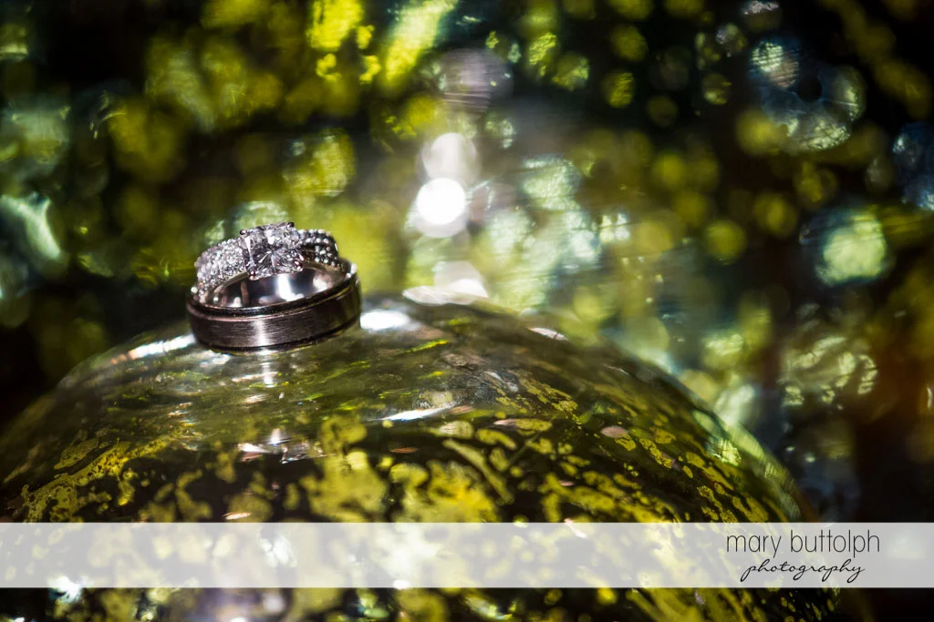Close up of couple's wedding rings at Skaneateles Country Club Wedding