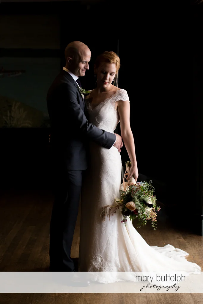 Couple in a dramatic shot at the Inns of Aurora Wedding