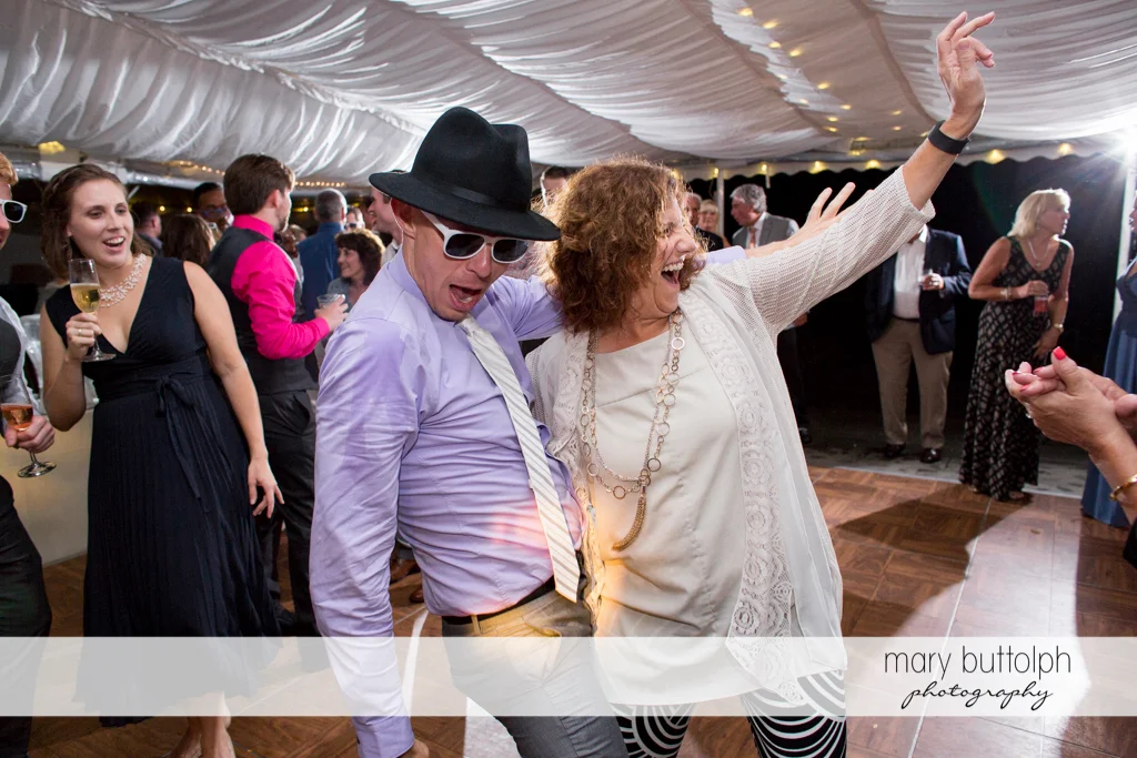 Guests show their moves on the dance floor at the Inns of Aurora Wedding