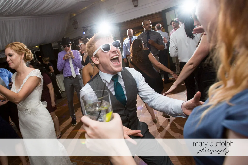 Guests having fun on the dance floor at the Inns of Aurora Wedding