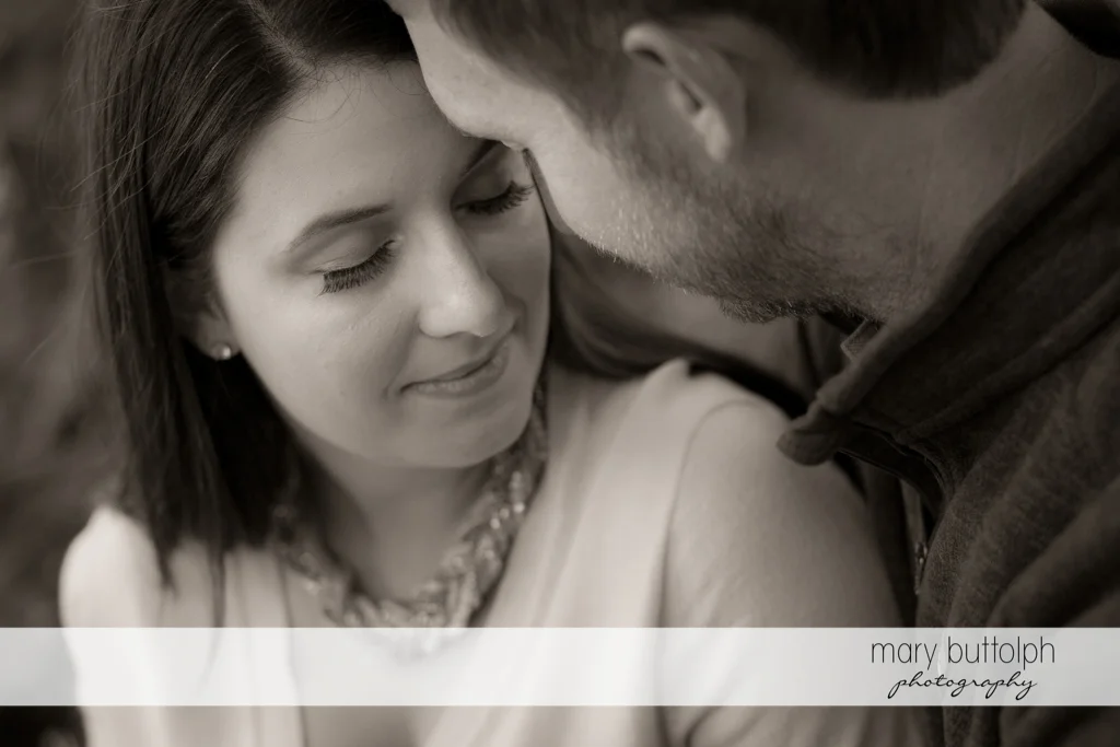 Couple share tender moment at Marcellus Engagement