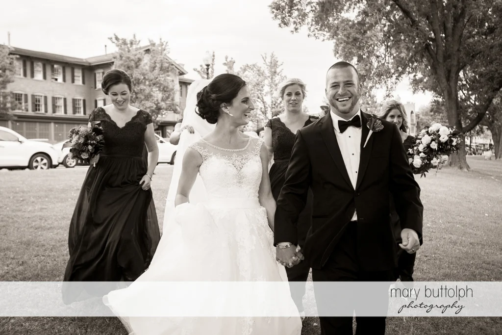 Couple and bridesmaids head to church at Anyela's Vineyards Wedding