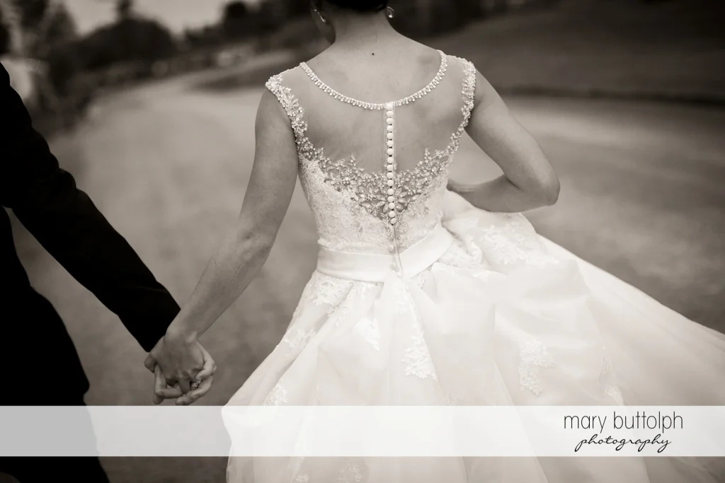 Back view of the bride's wedding dress at Anyela's Vineyards Wedding