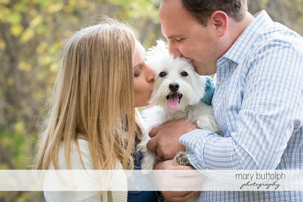 Couple smooch their pet dog at Erie Canal Engagement