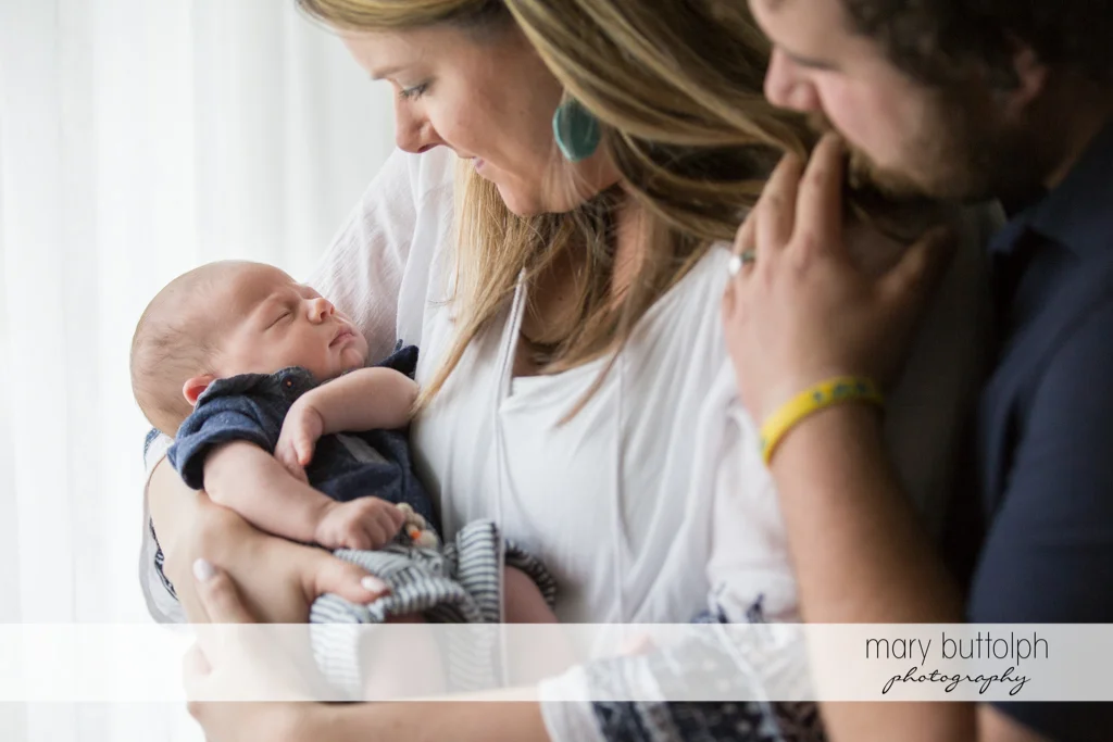 Couple can't get enough of their baby at Syracuse Newborn