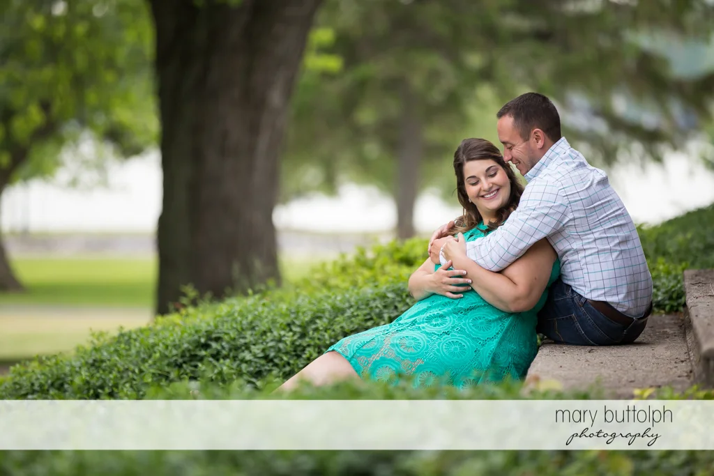 Couple relax in the park at Emerson Park Engagement