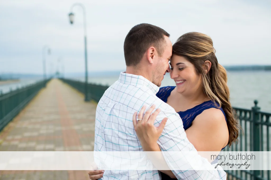 Couple dance by the lake at Emerson Park Engagement