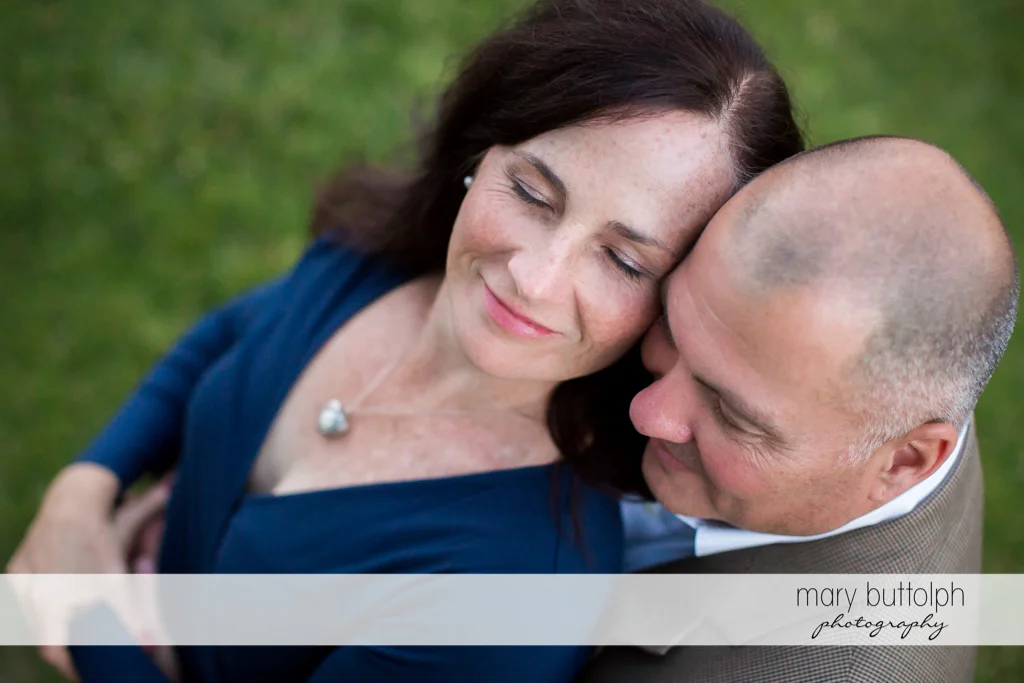Couple bask in their love in the garden at Skaneateles Engagement