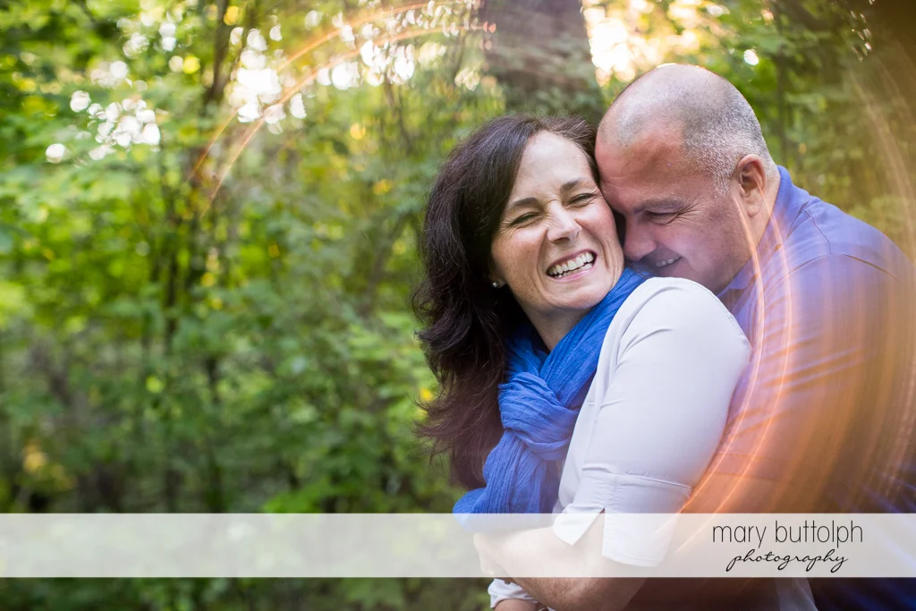 Couple share good times in the park at Skaneateles Engagement