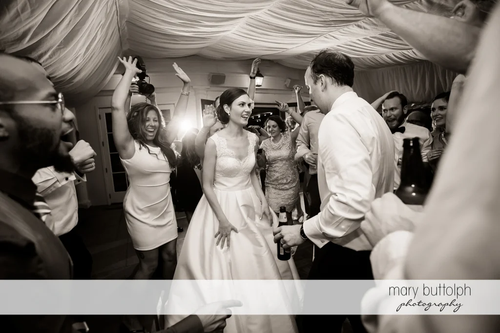 Couple show their dancing skills to guests at the reception at the Inns of Aurora Wedding