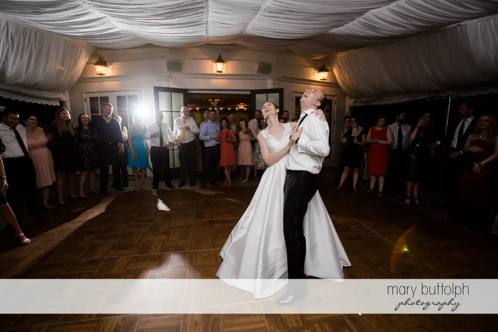 Couple have a great time on the dance floor at the Inns of Aurora Wedding