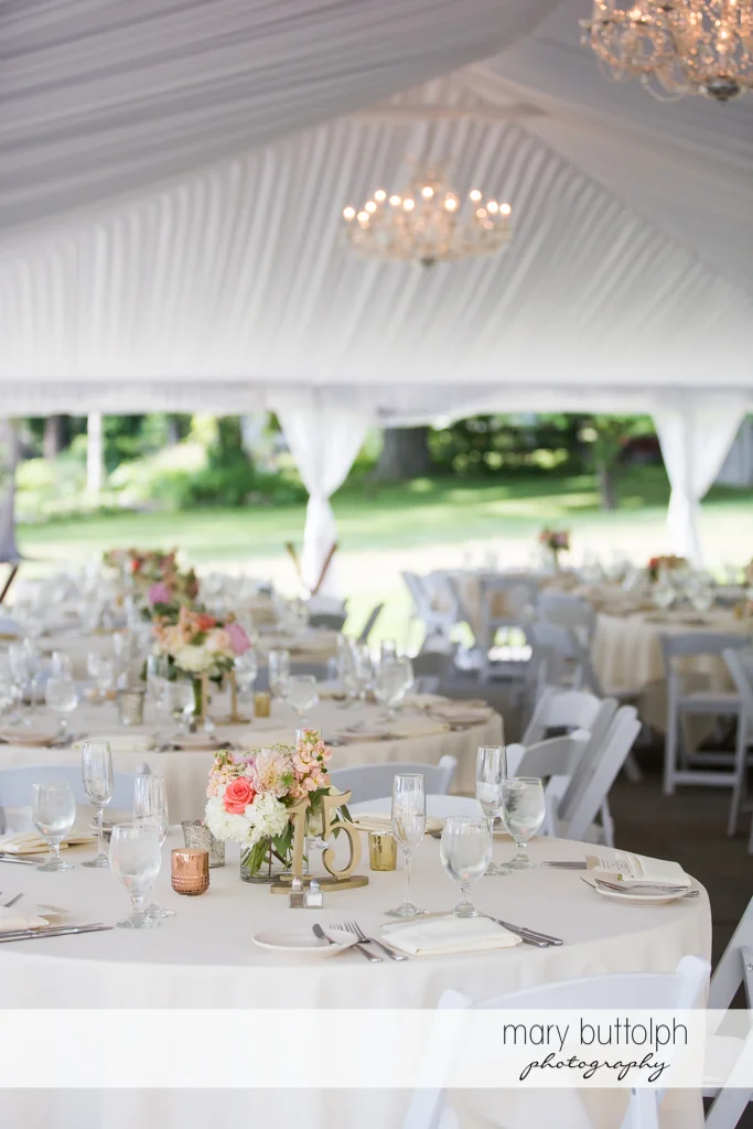 Dining tables at the wedding tent at the Inns of Aurora Wedding