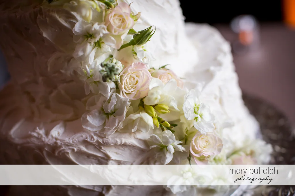 Couple's wedding cake is a work of art at The Lodge at Welch Allyn Wedding
