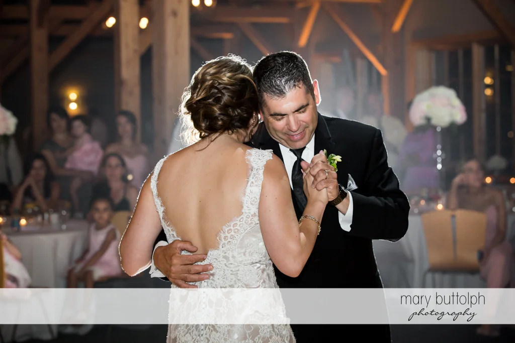 Guests dance at the wedding reception at The Lodge at Welch Allyn Wedding