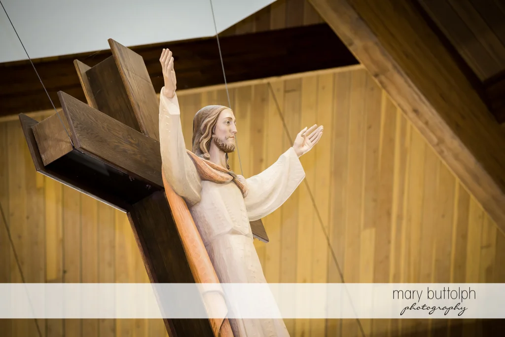 Christ on the cross at the altar at Genesee Grande Hotel Wedding