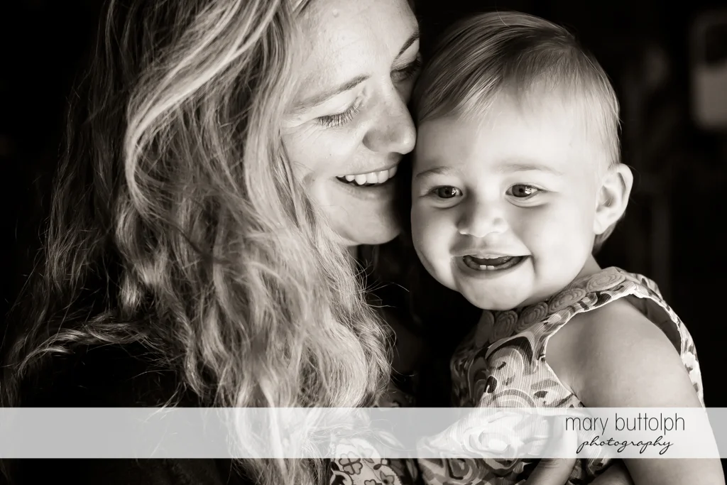 Woman and her daughter share a light moment at Skaneateles