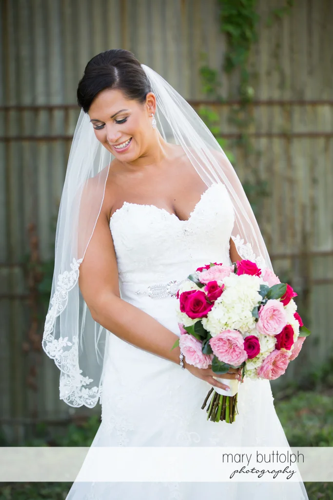 Bride with beautiful bouquet at The Lodge at Welch Allyn Wedding
