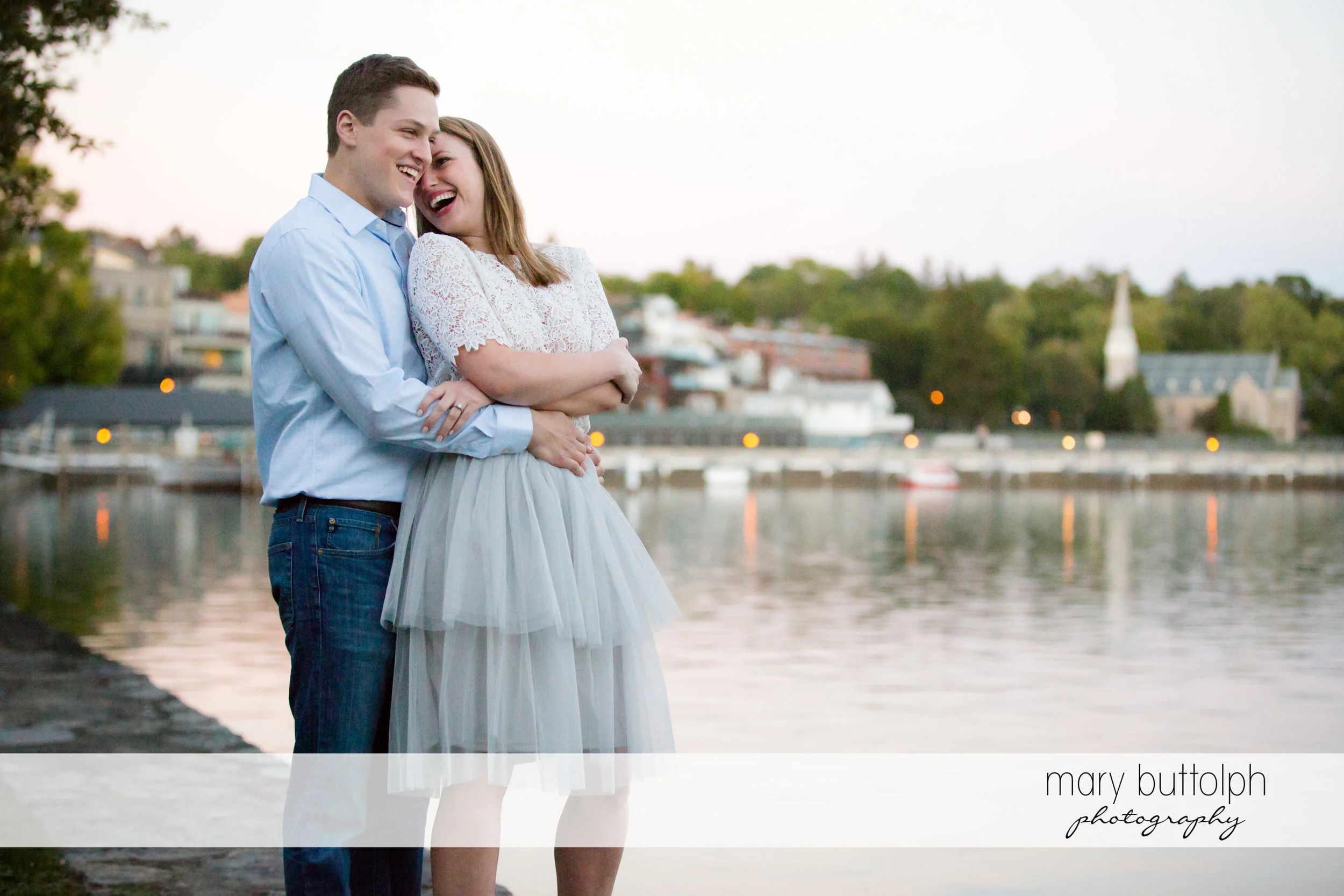Couple enjoy view near the lake at Skaneateles Engagement